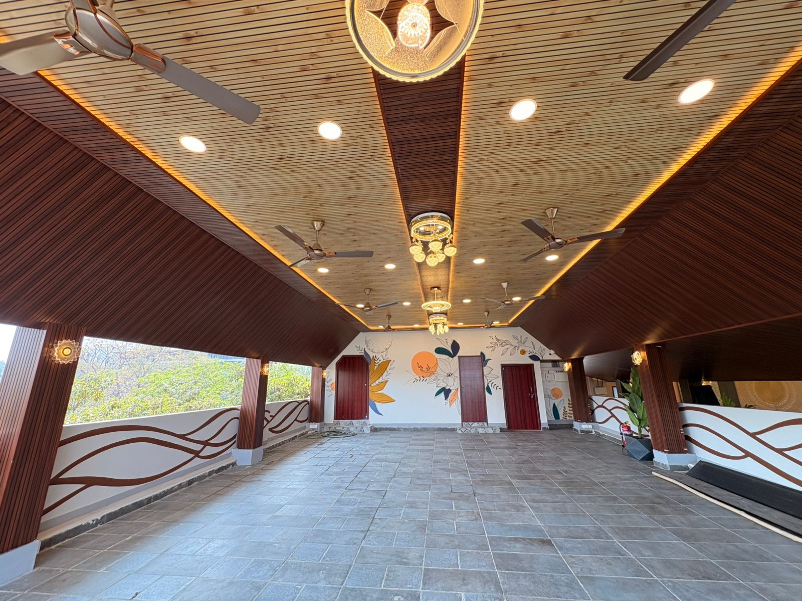 Spacious rooftop banquet hall setup at Sri Golden Meadows